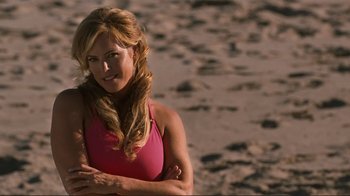 Movie still from “Valentine's Day” (2010), directed by Garry Marshall – A beautiful blonde woman in a pink top; Close Up shot, Over the shoulder angle