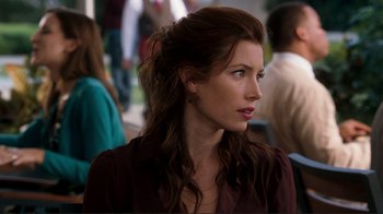 Movie still from “Valentine's Day” (2010), directed by Garry Marshall – A woman with long brown hair looking to her left; Close Up shot, Over the shoulder angle