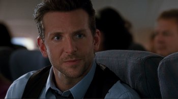 Movie still from “Valentine's Day” (2010), directed by Garry Marshall – A person sitting on a chair; Close Up shot, Over the shoulder angle