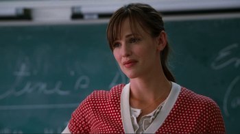 Movie still from “Valentine's Day” (2010), directed by Garry Marshall – A woman in a red and white polka dot shirt; Close Up shot, Over the shoulder angle