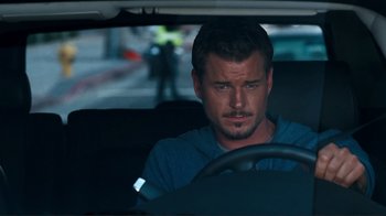 Movie still from “Valentine's Day” (2010), directed by Garry Marshall – A man sitting in the driver's seat of a car; Close Up shot, Over the shoulder angle