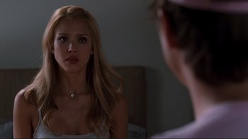 Movie still from “Valentine's Day” (2010), directed by Garry Marshall – A woman looking at a man in the mirror; Close Up shot, Over the shoulder angle