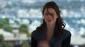 Movie still from “Valentine's Day” (2010), directed by Garry Marshall – A beautiful woman with long brown wavy hair; Close Up shot, Over the shoulder angle