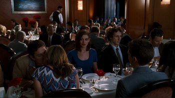 Movie still from “Valentine's Day” (2010), directed by Garry Marshall – A group of people sitting at a table in a restaurant; Medium shot, Over the shoulder angle