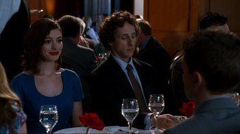 Movie still from “Valentine's Day” (2010), directed by Garry Marshall – A man and a woman sitting at a dinner table; Medium shot, Over the shoulder angle