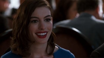 Movie still from “Valentine's Day” (2010), directed by Garry Marshall – A person with a smile on their face; Close Up shot, Over the shoulder angle