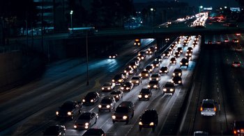 Movie still from “Valentine's Day” (2010), directed by Garry Marshall – A bunch of cars that are on the side of a road; Extreme Wide shot, High angle