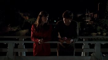 Movie still from “Valentine's Day” (2010), directed by Garry Marshall – A man and a woman standing next to each other; Medium shot, Over the shoulder angle