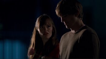 Movie still from “Valentine's Day” (2010), directed by Garry Marshall – A man and a woman standing next to each other; Close Up shot, Over the shoulder angle