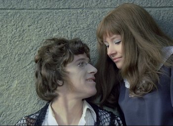 Movie still from “Valerie and Her Week of Wonders” (1970), directed by Jaromil Jires – A man and a woman laying next to each other on the ground; Close Up shot, High angle