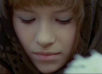 Movie still from “Valerie and Her Week of Wonders” (1970), directed by Jaromil Jires – A person's face with eyes closed; Close Up shot, High angle