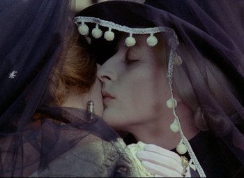 Movie still from “Valerie and Her Week of Wonders” (1970), directed by Jaromil Jires – A person wearing a veil; Close Up shot, Overhead angle