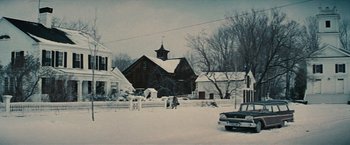 Movie still from “Valley of the Dolls” (1967), directed by Mark Robson – An old photo of an old church in the snow; Extreme Wide shot, High angle