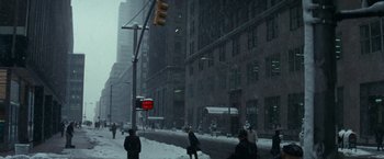 Movie still from “Valley of the Dolls” (1967), directed by Mark Robson – People are walking down a street in the snow; Extreme Wide shot, High angle