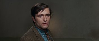 Movie still from “Valley of the Dolls” (1967), directed by Mark Robson – A person wearing a suit and tie; Close Up shot, High angle