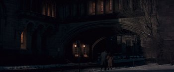 Movie still from “Valley of the Dolls” (1967), directed by Mark Robson – Two people are walking on the sidewalk in the dark; Extreme Wide shot, High angle