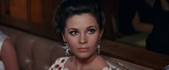 Movie still from “Valley of the Dolls” (1967), directed by Mark Robson – A person wearing a dress; Close Up shot, Low angle