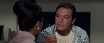 Movie still from “Valley of the Dolls” (1967), directed by Mark Robson – A man and a woman are talking to each other; Close Up shot, Over the shoulder angle