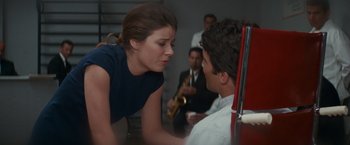 Movie still from “Valley of the Dolls” (1967), directed by Mark Robson – A man and a woman talking to each other; Medium shot, Over the shoulder angle