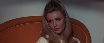 Movie still from “Valley of the Dolls” (1967), directed by Mark Robson – A person with long blonde hair; Close Up shot, High angle