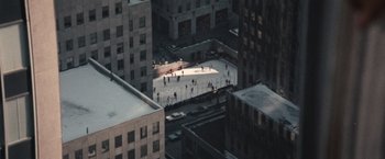 Movie still from “Valley of the Dolls” (1967), directed by Mark Robson – An aerial view of people skating on an ice skating rink; Extreme Wide shot, High angle