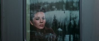 Movie still from “Valley of the Dolls” (1967), directed by Mark Robson – A person looking out a window; Close Up shot, High angle