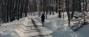 Movie still from “Valley of the Dolls” (1967), directed by Mark Robson – A person walking down a snow covered path; Extreme Wide shot, High angle