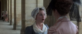 Movie still from “Valmont” (1989), directed by Milos Forman – Two women in period clothing talking to each other; Close Up shot, Over the shoulder angle