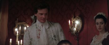 Movie still from “Valmont” (1989), directed by Milos Forman – A man in a white shirt with a bow tie; Close Up shot, Over the shoulder angle