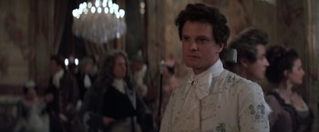 Movie still from “Valmont” (1989), directed by Milos Forman – A man wearing a white shirt and a white tie; Close Up shot, Over the shoulder angle