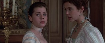 Movie still from “Valmont” (1989), directed by Milos Forman – Two young women looking in the same direction in a mirror; Close Up shot, Over the shoulder angle