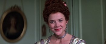 Movie still from “Valmont” (1989), directed by Milos Forman – A person wearing a dress; Close Up shot, Low angle