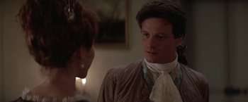 Movie still from “Valmont” (1989), directed by Milos Forman – A man and a woman are talking to each other; Close Up shot, Over the shoulder angle