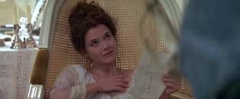 Movie still from “Valmont” (1989), directed by Milos Forman – A young woman is holding a letter in her hands; Close Up shot, Over the shoulder angle