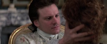 Movie still from “Valmont” (1989), directed by Milos Forman – A person wearing a shirt; Close Up shot, Over the shoulder angle