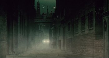 Movie still from “Vampire Hunter D: Bloodlust” (2000), directed by Yoshiaki Kawajiri – An empty street in a dark city at night; Extreme Wide shot, High angle