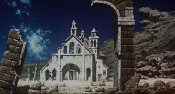 Movie still from “Vampire Hunter D: Bloodlust” (2000), directed by Yoshiaki Kawajiri – An old church is shown in ruins with the sky in the background; Extreme Wide shot, Low angle