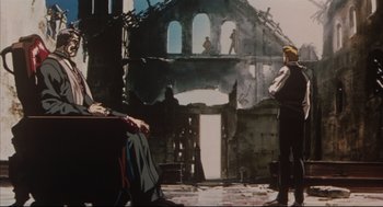 Movie still from “Vampire Hunter D: Bloodlust” (2000), directed by Yoshiaki Kawajiri – A painting of a man standing in front of an old building; Wide shot, Low angle