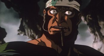 Movie still from “Vampire Hunter D: Bloodlust” (2000), directed by Yoshiaki Kawajiri – An animated man with a bandage on his head; Close Up shot, Low angle