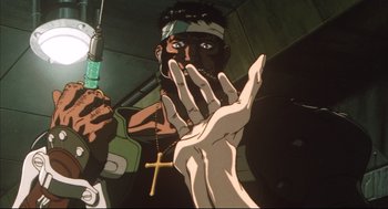 Movie still from “Vampire Hunter D: Bloodlust” (2000), directed by Yoshiaki Kawajiri – An animated picture of a man with a cross on his head; Extreme Close Up shot, Low angle
