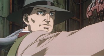 Movie still from “Vampire Hunter D: Bloodlust” (2000), directed by Yoshiaki Kawajiri – An animated picture of a man in a hat; Extreme Close Up shot, Low angle