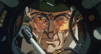 Movie still from “Vampire Hunter D: Bloodlust” (2000), directed by Yoshiaki Kawajiri – An old man wearing glasses and a hat; Close Up shot, Low angle