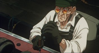 Movie still from “Vampire Hunter D: Bloodlust” (2000), directed by Yoshiaki Kawajiri – An old man is working on a piece of metal; Medium shot, Low angle