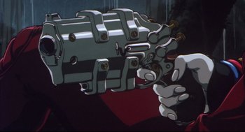 Movie still from “Vampire Hunter D: Bloodlust” (2000), directed by Yoshiaki Kawajiri – An animated hand holding a large metal object; Extreme Close Up shot, Low angle