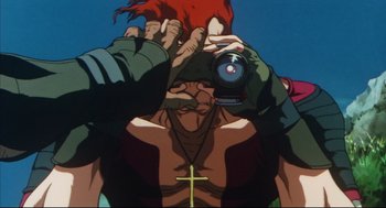 Movie still from “Vampire Hunter D: Bloodlust” (2000), directed by Yoshiaki Kawajiri – A person taking a picture of a person with a camera; Close Up shot, Low angle