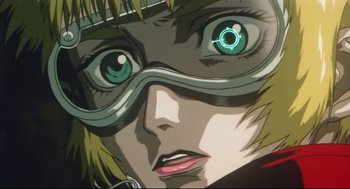 Movie still from “Vampire Hunter D: Bloodlust” (2000), directed by Yoshiaki Kawajiri – A woman's face wearing goggles; Extreme Close Up shot, Low angle