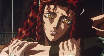Movie still from “Vampire Hunter D: Bloodlust” (2000), directed by Yoshiaki Kawajiri – A woman with red hair looking at the camera; Close Up shot, Low angle