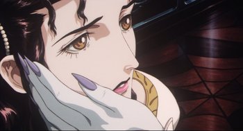 Movie still from “Vampire Hunter D: Bloodlust” (2000), directed by Yoshiaki Kawajiri – A woman's face with a cat in her mouth; Extreme Close Up shot, Low angle