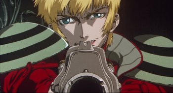 Movie still from “Vampire Hunter D: Bloodlust” (2000), directed by Yoshiaki Kawajiri – A blond haired man is holding a gun in his hands; Close Up shot, Low angle