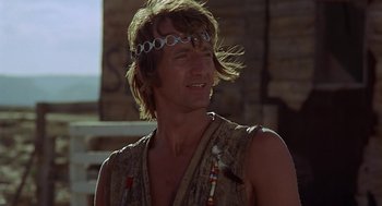 Movie still from “Vanishing Point” (1971), directed by Richard C. Sarafian – A person wearing a headband; Close Up shot, Low angle